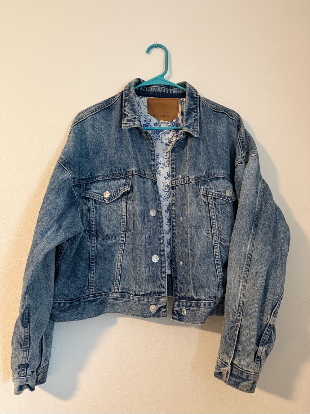 American Eagle cropped floral lined blue denim jacket
